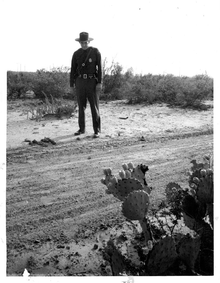Border Patrol USBP CBP   agent checking footprints signcutting