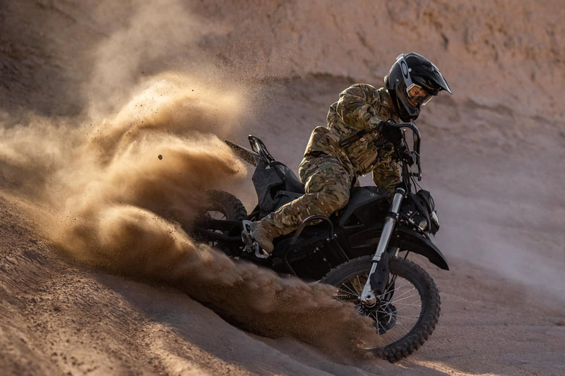 Border Patrol USBP miscellaneous modern motorcycle agent turning throwing dust and dirt