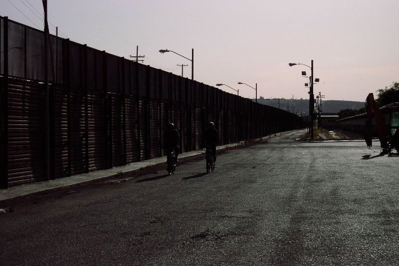 Border Patrol USBP miscellaneous modern agents walking along fence