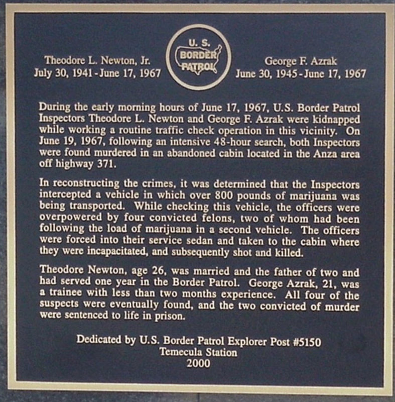The plaque on the Theodore Newton and George Azrak Memorial.
