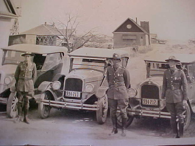 Miscellaneous Historical history old inspectors posing in dress uniform in front of cars