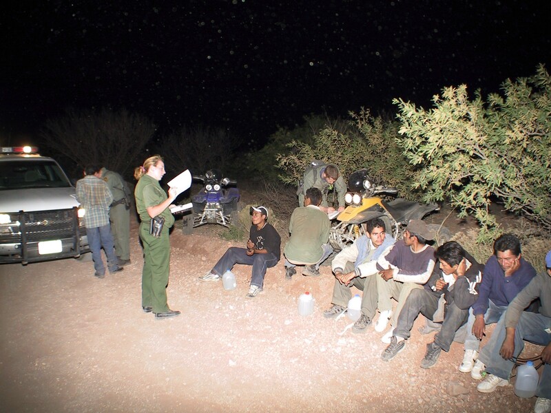 Border Patrol USBP miscellaneous modern female agent watch and interviewing arrested aliens at night