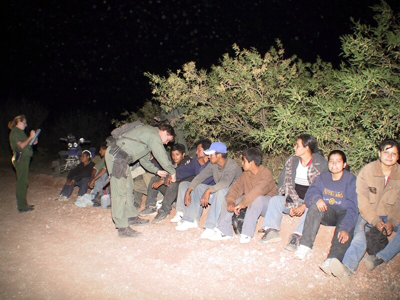 Border Patrol USBP miscellaneous modern agent watch and interviewing arrested aliens at night
