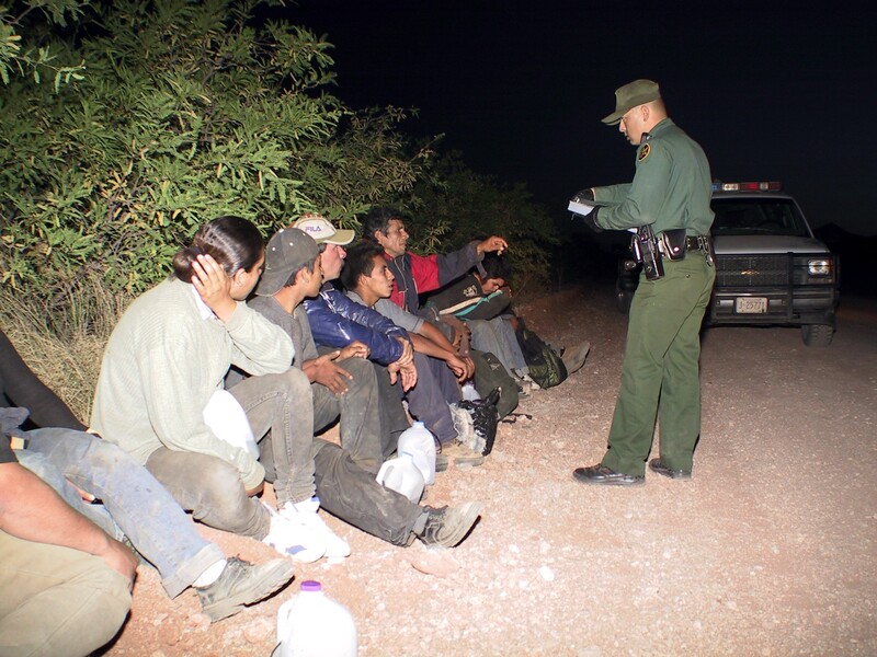 Border Patrol USBP miscellaneous modern agent watch and interviewing arrested aliens at night