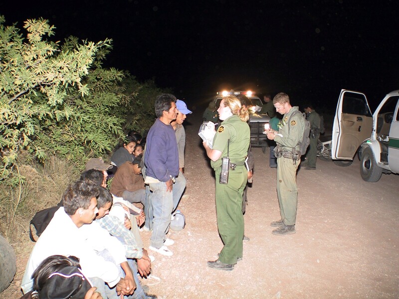 Border Patrol USBP miscellaneous modern female agent watch and interviewing arrested aliens at night