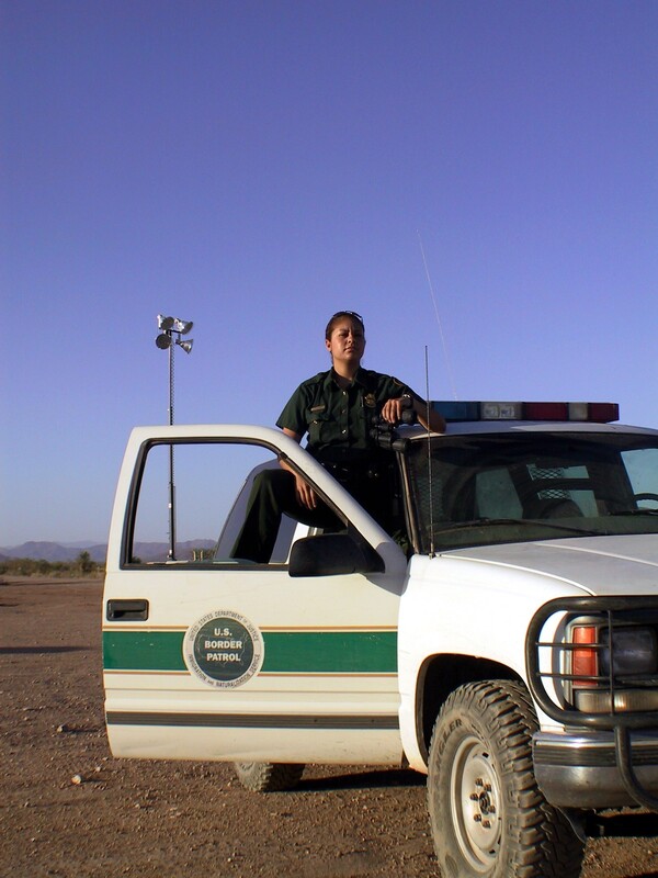 Border Patrol USBP miscellaneous modern agent poses in vehicle
