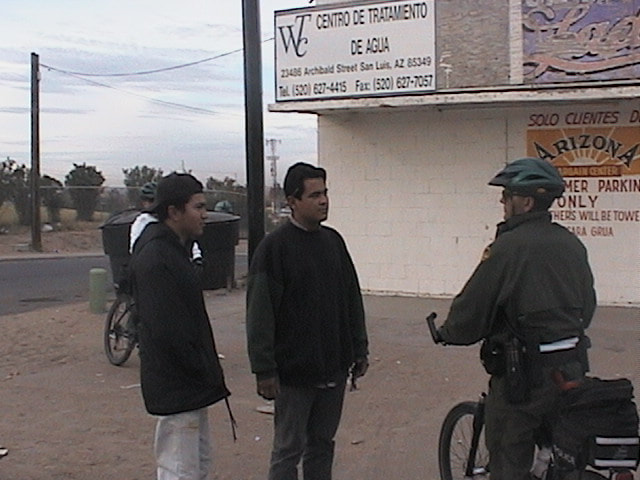 Border Patrol USBP miscellaneous modern bike patrol agent arresting two aliens