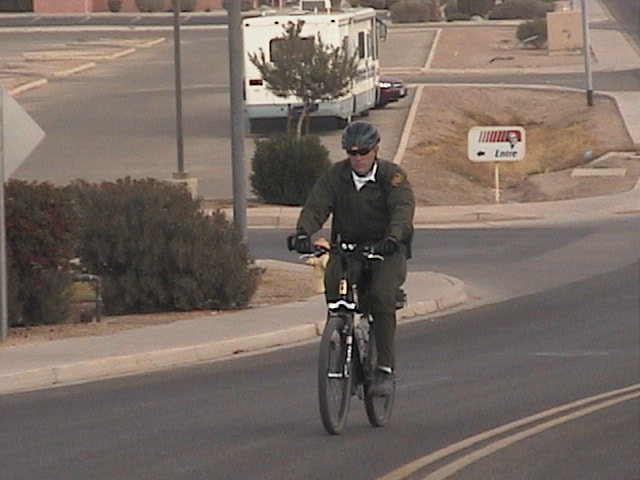 Border Patrol USBP miscellaneous modern bike patrol agent riding in the city