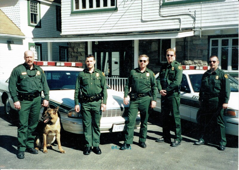 Border Patrol USBP miscellaneous modern agents posing in front of vehicles with canine k9