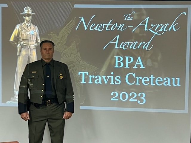 Travis Creteau Newton-Azrak Award Backdrop