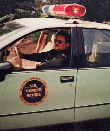 Border Patrol Agent Ray Harris in a seafood green car