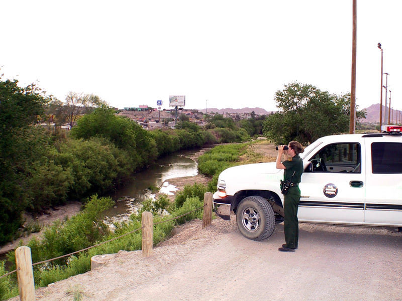 Border Patrol USBP miscellaneous modern female agent watch the river
