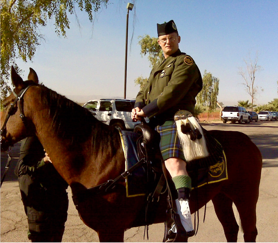 Border Patrol Bagpiper on a Border Patrol horse.