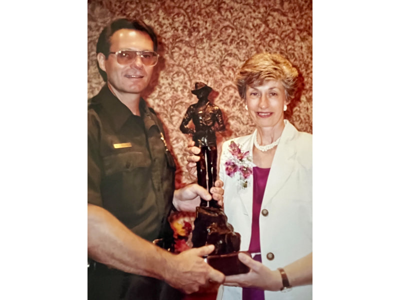 Senior Patrol Agent Michael Deshaies with INS Commissioner Doris Meissner, 1993