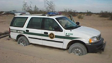 Border Patrol USBP miscellaneous modern vehicle stuck in the sand high centered