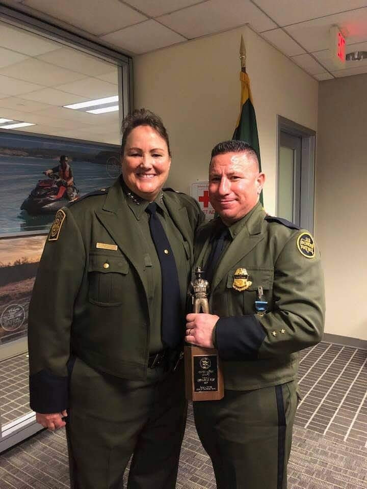 Osbaldo Rios, Newton-Azrak Award recipient with Chief of the Border Patrol Carla Provost