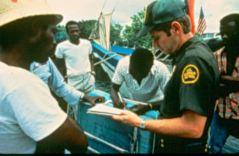 USBP Border Patrol photographs 1970-1990 an agent conducting workplace checks