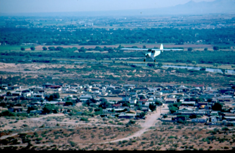 USBP Border Patrol photographs 1970-1990 an airplane flying low