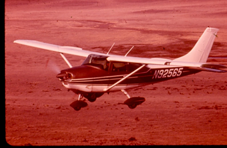 USBP Border Patrol photographs 1970-1990 a low flying airplane