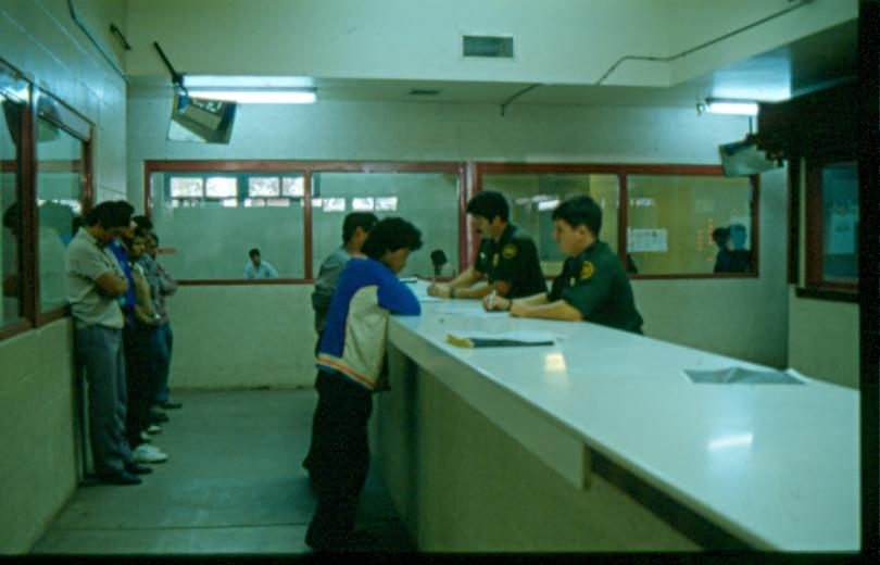 USBP Border Patrol photographs 1970-1990 agent process aliens at a state 