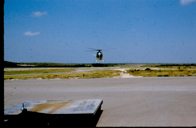 USBP Border Patrol photographs 1970-1990 helicopter coming in for a landing