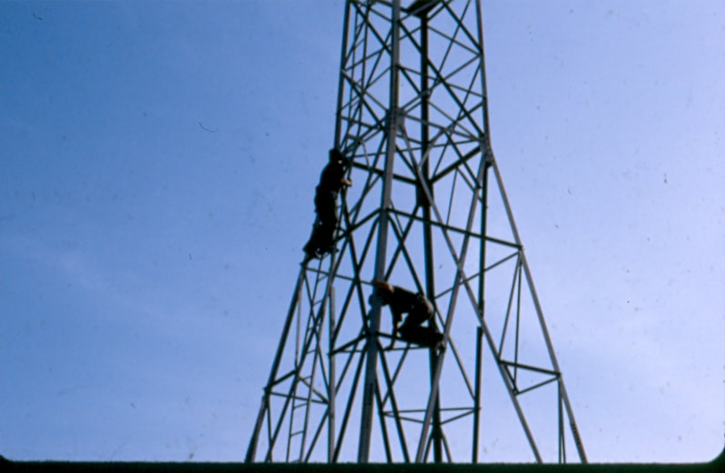 USBP Border Patrol photographs 1970-1990 two agents climbing an observation tower