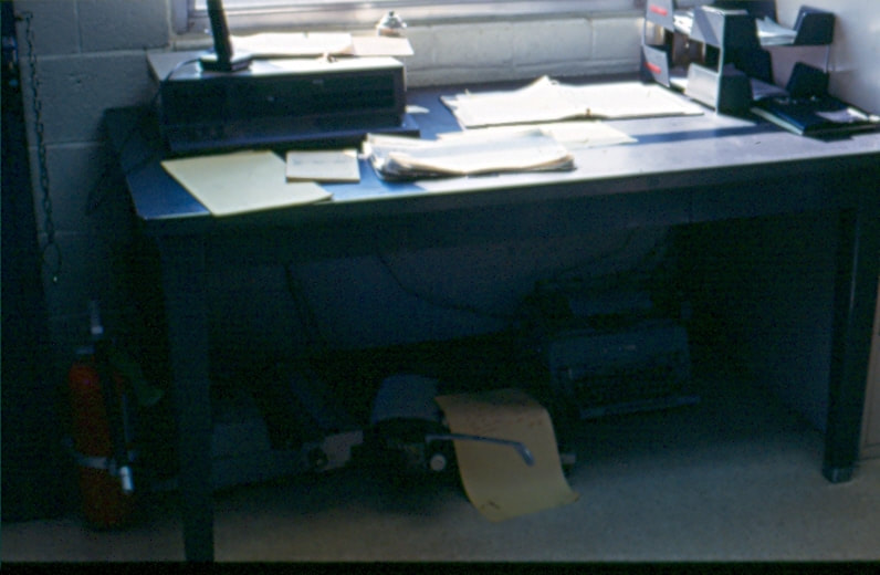 USBP Border Patrol photographs 1970-1990 a desk at a station