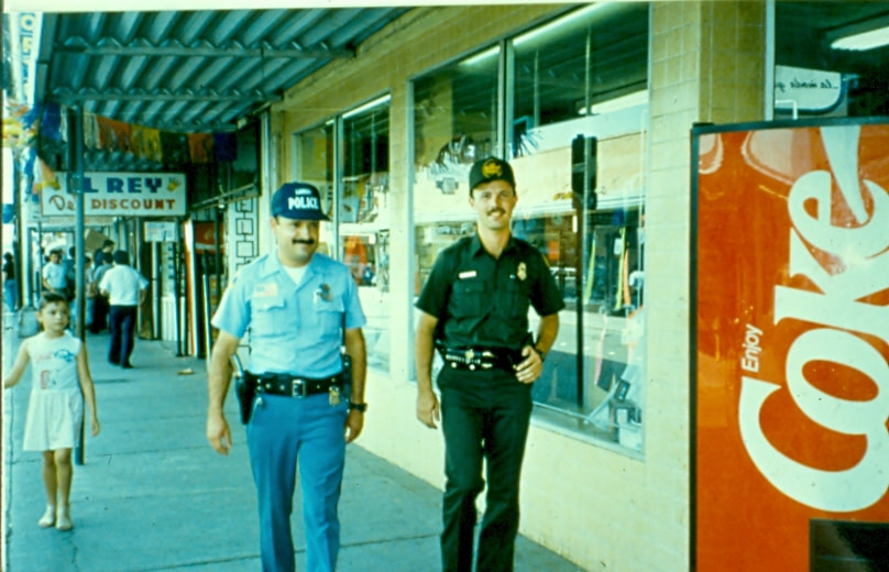 USBP Border Patrol photographs 1970-1990 agent walking next to a Laredo police officer