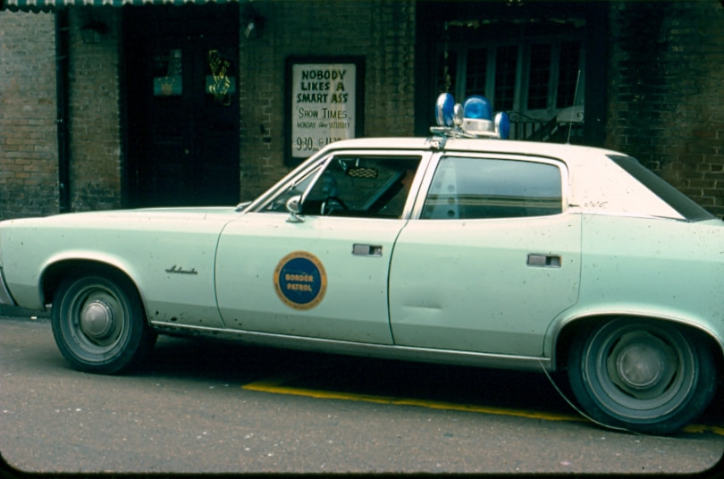 USBP Border Patrol photographs 1970-1990 sea foam green car with blue lights