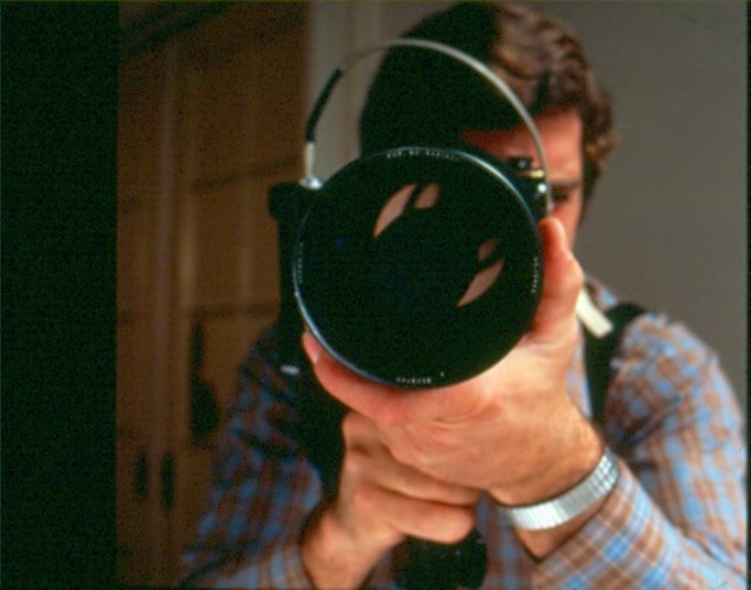 USBP Border Patrol photographs 1970-1990 person looking through a scope