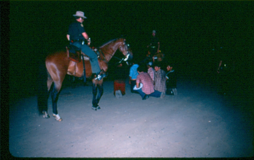 USBP Border Patrol photographs 1970-1990 horse patrol apprehending people at night
