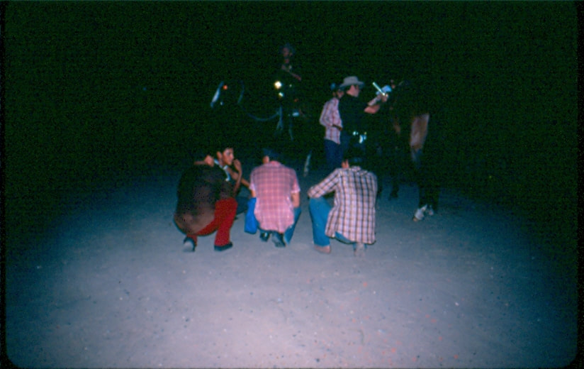 USBP Border Patrol photographs 1970-1990 agents arrest a group of people at night