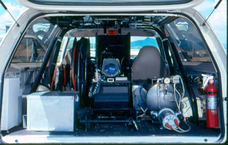 USBP Border Patrol photographs 1970-1990 the inside of an SUV equipped with a scope