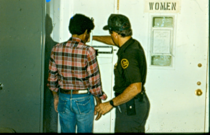 USBP Border Patrol photographs 1970-1990 agent processing an alien