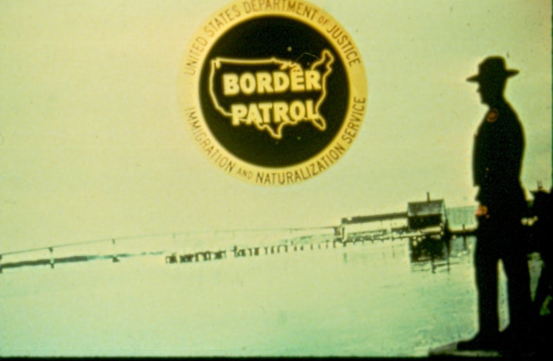 USBP Border Patrol photographs 1970-1990  agent at a marina