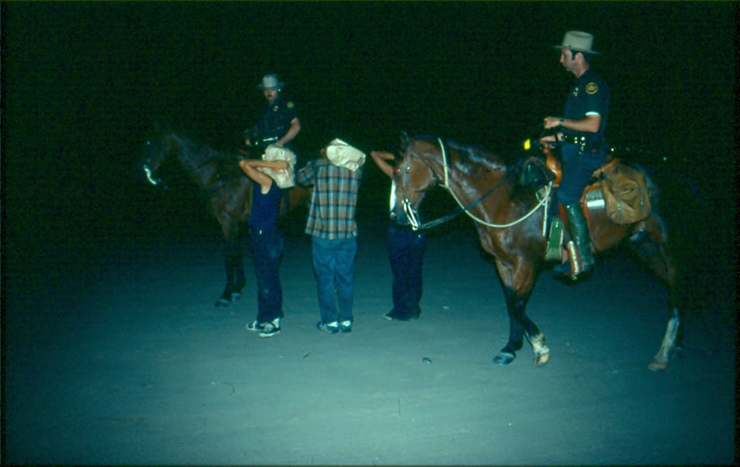 USBP Border Patrol photographs 1970-1990  horse patrol arresting people at night agents