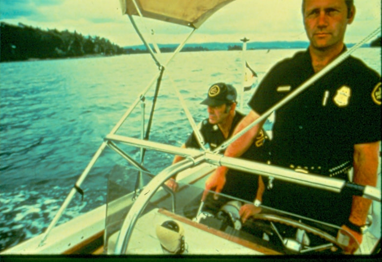USBP Border Patrol photographs 1970-1990  two agents in a boat